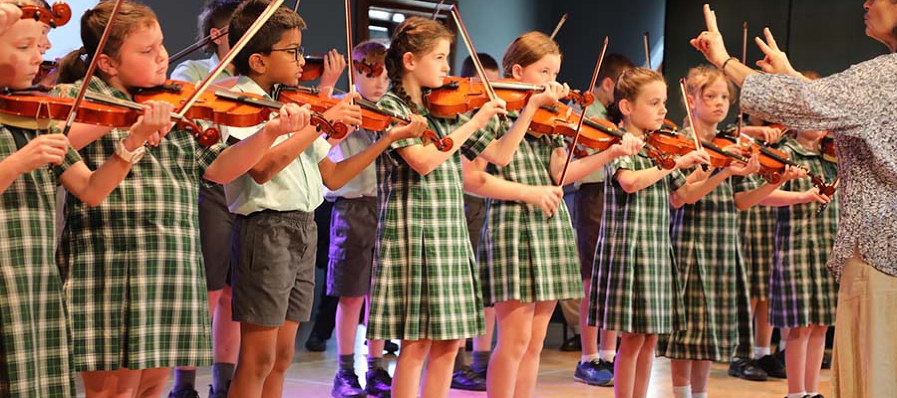 Students playing the violin